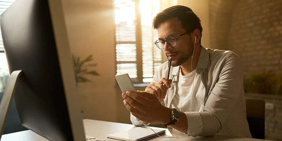 Business owner looking at their own website on a laptop
